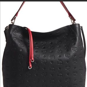MCM Klara Monogrammed Leather Hobo Bag.